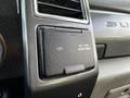 Close-up of a power outlet panel in a 2018 Ford F-550 with labels for 12V and AC 110V 400W MAX