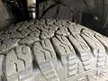 Close-up of a tire from a 2023 Ford Transit showing deep tread patterns designed for traction and stability
