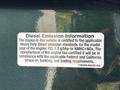 A sticker on a 2008 Ford F-550 that provides diesel emission information and compliance details for the engine