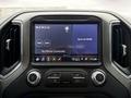 Interior dashboard of a 2022 GMC Sierra 3500HD featuring a touchscreen display for radio and settings with various buttons below