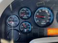 Dashboard gauges of a 2013 International DuraStar 4300 displaying readings for temperature oil pressure water temperature and RPM