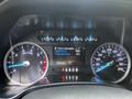 Dashboard of a 2020 Ford F-350 Super Duty showing instrument gauges including RPM and speedometer along with engine information display