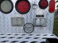 2008 Ford F-450 with electrical outlets and various light indicators on a metallic surface
