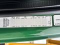 A 2015 Freightliner M2 106 door label with specifications including weight ratings and tire sizes