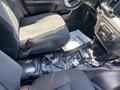 Interior of a 2019 Dodge Charger showing the driver's seat and dashboard area with exposed wiring and materials on the floor