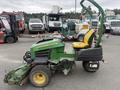 A 2009 John Deere 2653B Precision lawn mower with a yellow seat and green body featuring a front cutting deck and large rear wheels