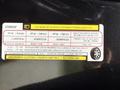 A 2018 RAM 1500 vehicle specifications label displaying tire information, load ratings, and other vehicle details