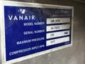 A metal identification plate with specifications for a Vanair model 160 UDSM, including model number, serial number, maximum pressure, and compressor input RPM