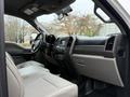Interior of a 2019 Ford F-350 SD featuring leather seats a touchscreen display and dashboard controls