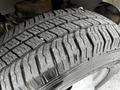 Close-up of a tire from a 2019 Chevrolet Express showcasing detailed tread patterns and surface texture