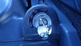 A key ignition switch labeled with heat off on start located on the control panel of a 2021 Hitachi 55USR excavator