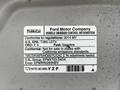 2014 Ford F-150 vehicle emission control information label with details on compliance and fuel type