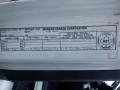 A 2014 International Durastar truck identification plate displaying specifications and manufacturing information