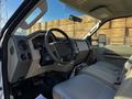 Interior of a 2008 Ford F-450 SD featuring a steering wheel, dashboard with gauges, and leather seats