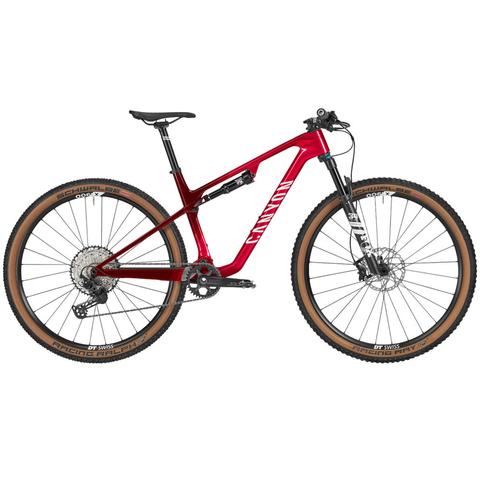 2025 Canyon Lux World Cup CF 8 Mountain Bike in a glossy red finish featuring a full suspension design wide tires and disc brakes