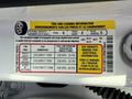 Tire and loading information label for a 2020 Ford Escape showing seating capacity tire sizes and pressure specifications