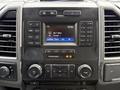 Dashboard of a 2017 Ford F-350 SD featuring a digital display audio system with radio controls and temperature settings