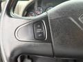 Close-up of the steering wheel of a 2014 International TerraStar featuring a cruise control switch labeled as ON and OFF