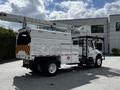 A 2012 Freightliner M2 106 bucket truck with a white body and a hydraulic lift mounted on the back for reaching high areas