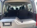 Interior view of a 2006 Land Rover LR3 showing the rear seats and cargo area with a black interior and no items present