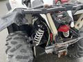 2017 Polaris Scrambler featuring large rear tires visible suspension components and a rugged design