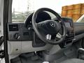 Interior view of a 2017 Mercedes-Benz Sprinter showing the steering wheel dashboard and control panel