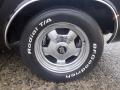 A chrome wheel of a 1974 Dodge Challenger featuring a black tire marked with Radial T/A and BFGoodrich branding