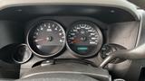 Dashboard of a 2013 Chevrolet Silverado 1500 displaying speedometer tachometer and fuel gauge