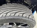 Close-up of a Kenda tire on a 2020 Polaris Slingshot showcasing the tread pattern and rim design