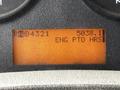 Display panel of a 2011 International 4400 showing numerical readings and indicators for engine hours and power take-off status