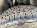 Close-up of a tire tread from a 2019 Dodge Charger showing detailed patterns and wear characteristic of a performance vehicle tire