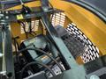 A 2024 AGT Industrial Yellow H13R Mini Excavator with visible engine components and wiring in a compact design