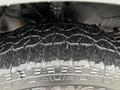 Close-up of a tire on a 2018 Ford Transit showcasing the tread pattern and sidewall details