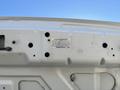 White panel of a 2016 Ford F-550 displaying a custom pump identification label with various identification numbers and specifications