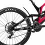 2025 Canyon Sender CFR Mullet Mountain Bike featuring a sleek black and pink frame with prominent suspension components and a Maxxis tire on the rear wheel