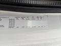 A 2017 Freightliner M2 106 vehicle information label displaying weight ratings axle details and tire specifications
