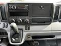 Dashboard of a 2015 Mitsubishi Fuso FE with audio system controls gear shifter and climate controls
