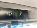 Control panel with switches labeled for left hand window and right hand window in a 2008 Peterbilt 340