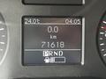A digital display showing the odometer reading 71618 km and the current temperature at 24 degrees Celsius in a 2023 Mercedes-Benz Sprinter
