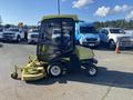 A 2010 Kubota F3680 tractor with a yellow and black cab and a front-mounted mowing deck