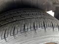 Close-up of a tire on a 2019 Ford Transit Connect showing detailed tread pattern and sidewall design