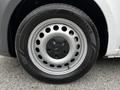 A close-up of a silver wheel rim with black tire showcasing the Mercedes-Benz logo and tire details