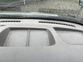 Dashboard view of a 2017 Chevrolet Express with a textured surface and air vents visible