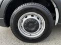 A close-up view of a silver alloy wheel with a black tire featuring a tread pattern labeled Genearl E3 on a 2020 Ford Transit