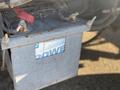 A weathered blue battery with a label reading "POWER" and various connections on top