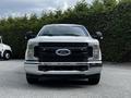 A 2017 Ford F-250 pickup truck with a chrome grille and headlights facing directly forward