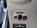 Control panel featuring buttons for inverter, modem, and booster with a toggle switch and a red indicator light