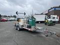 2011 Hightliner Aquacide Hot Water Weed Control Dual Flat Deck Trailer with attached equipment and tanks on a dual axle design