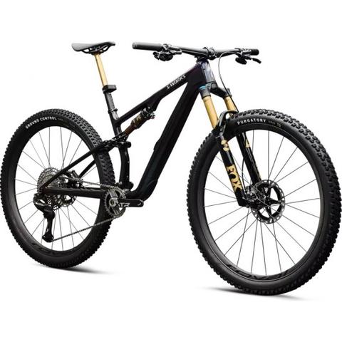 2026 Specialized S-Works Epic 8 EVO Di2 Mountain Bike with a sleek black frame gold suspension and wide black tires designed for high performance on rugged terrain