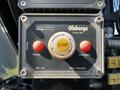 Control panel with buttons labeled Power and Stop along with a switch for Off/On and a setting for Man/Remote